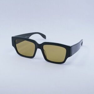 Alexander McQueen AM0329S 004 Sunglasses Green Square Frame, Yellow Lenses